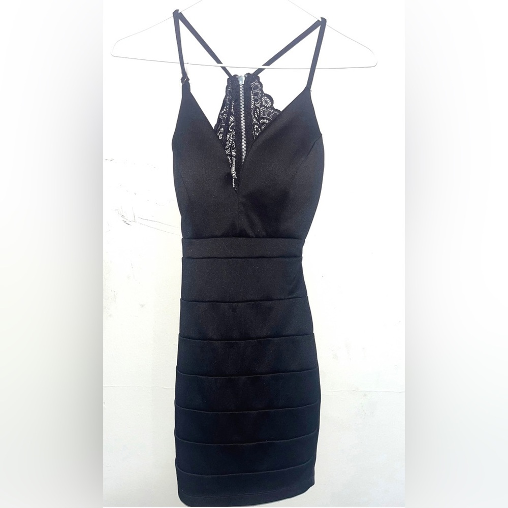 Black silk cocktail dress with open laced back